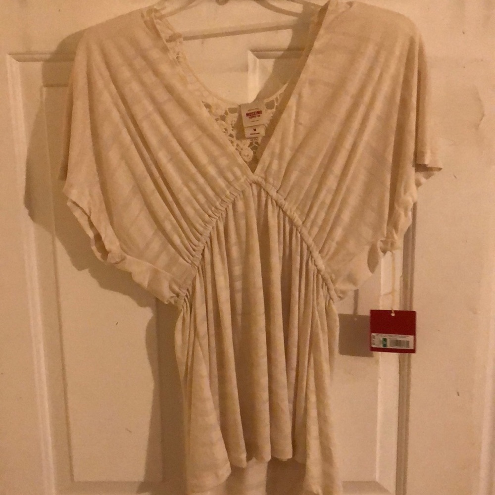 Embroidered flowy top